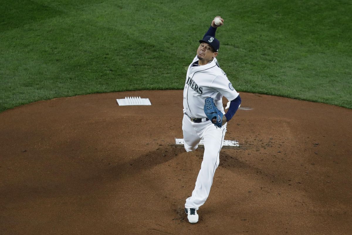 Mariners starting pitcher Felix Hernandez throws to a Cleveland Indians batter during the first inning of a game Thursday, March 29, 2018, in Seattle. (Ted S. Warren / Associated Press)