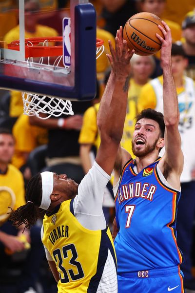 Oklahoma City forward Chet Holmgren attempts a shot against Indiana’s Myles Turner during Game 4 of the NBA Finals on Friday at Gainbridge Fieldhouse in Indianapolis. (Getty Images)