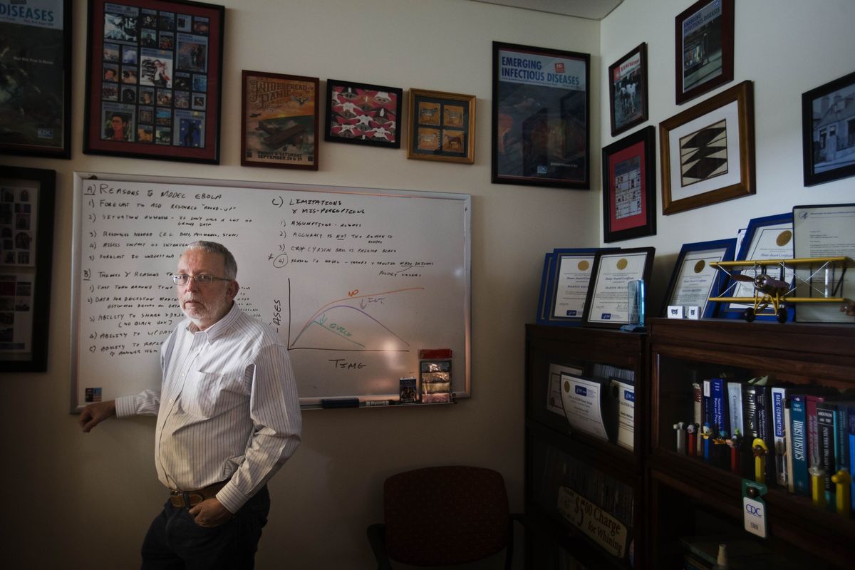 Martin Meltzer stands in his office at the Centers for Disease Control and Prevention in Atlanta. (Associated Press)