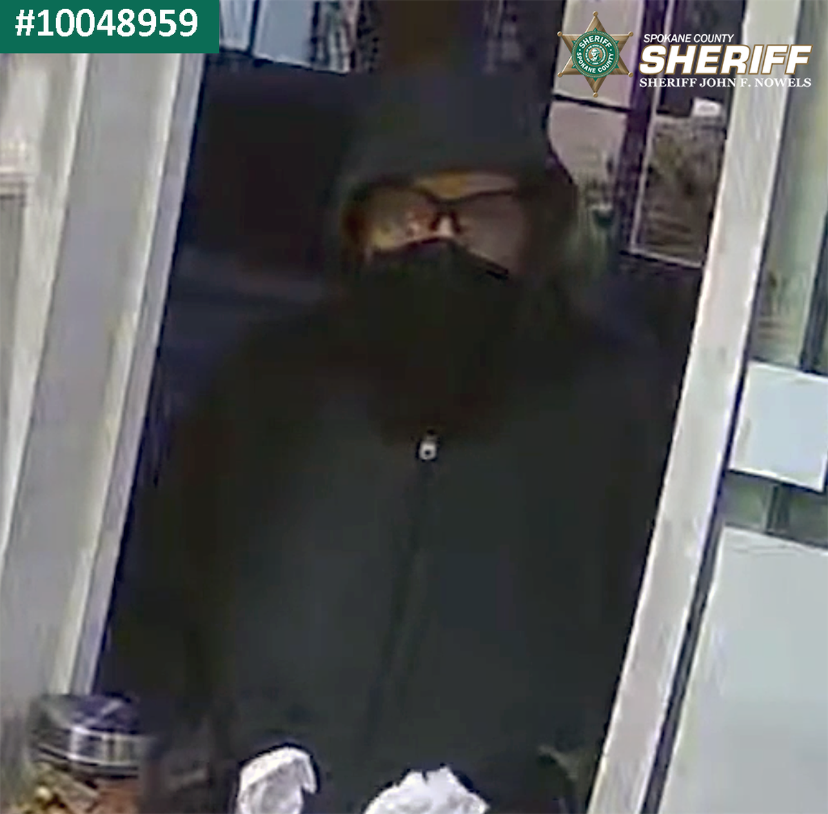 Spokane Valley police are looking for a man suspected of showing a gun and robbing Crush Coffee Wednesday morning.  (Courtesy of Spokane County Sheriff's Office)