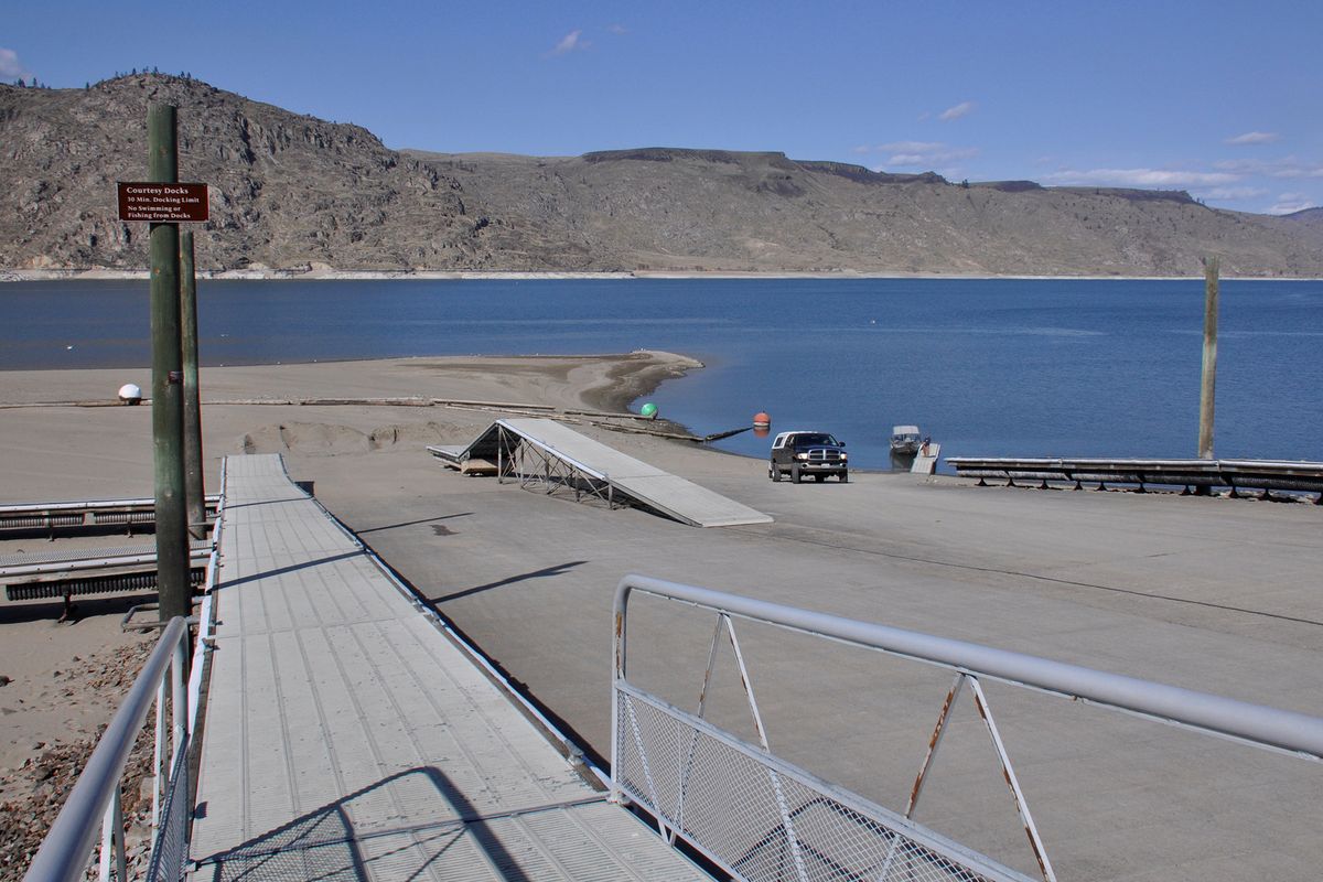 The annual drawdown of Lake Roosevelt is bringing the water below the main docks and nearly to the end of the boat ramp at Spring Canyon access. (Rich Landers)