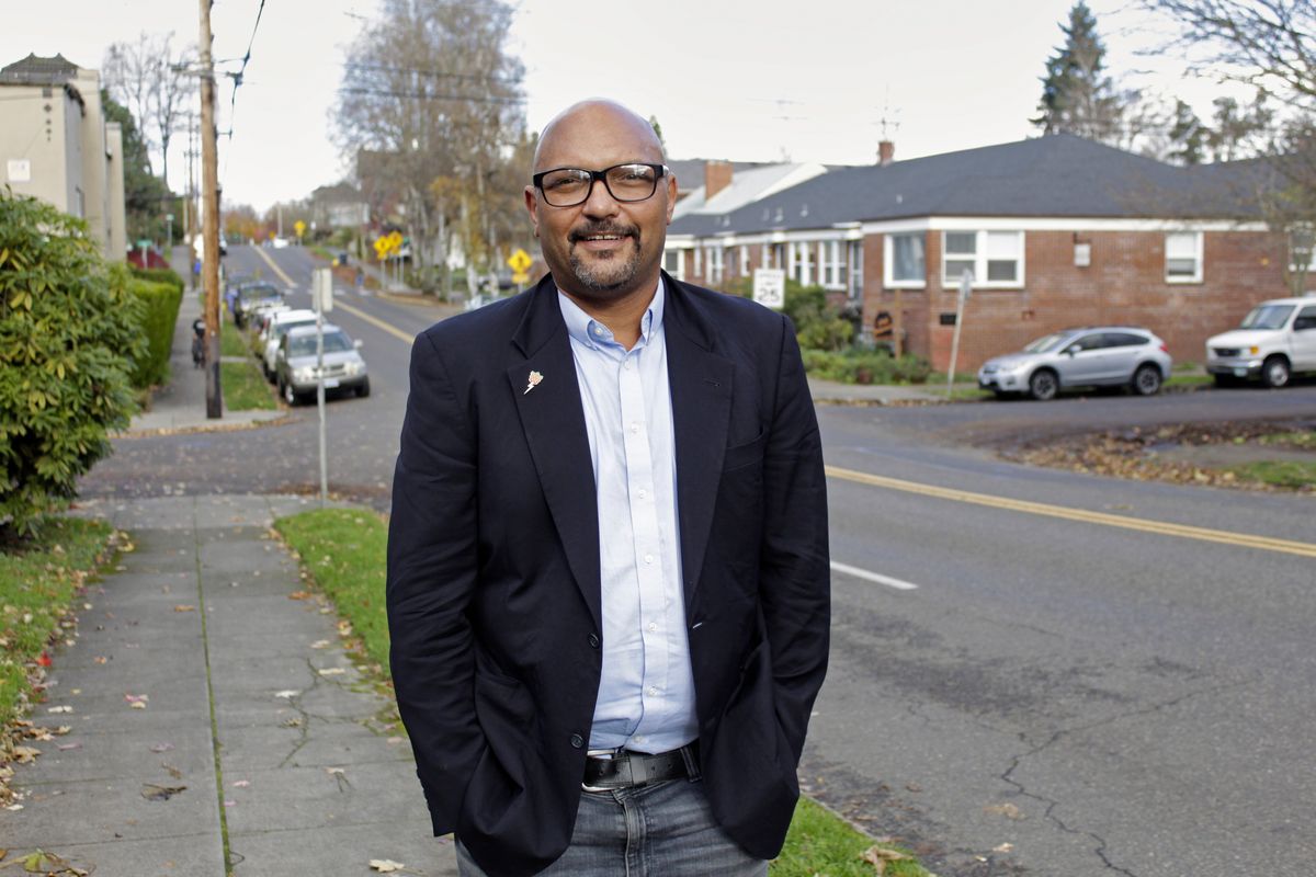 Portland City Councilman Mingus Mapps poses in front of his house in southwest Portland on Nov. 16. (Gillian Flaccus)