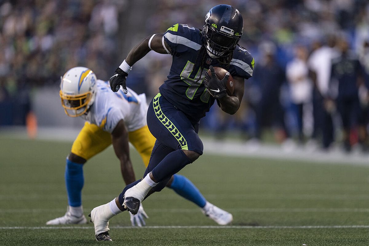 Seattle Seahawks running back Alex Collins runs with the ball during an NFL preseason football game, Saturday, Aug. 28, 2021, in Seattle. The Seahawks won 27-0.  (Associated Press)