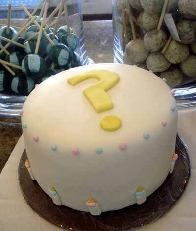 This undated photo provided by Megan Faulkner Brown, founder of the Utah-based bake shop The Sweet Tooth Fairy, shows a cake the bake shop made for an expectant Utah mother who wanted the gender of her baby to be revealed using cake.  (Associated Press)