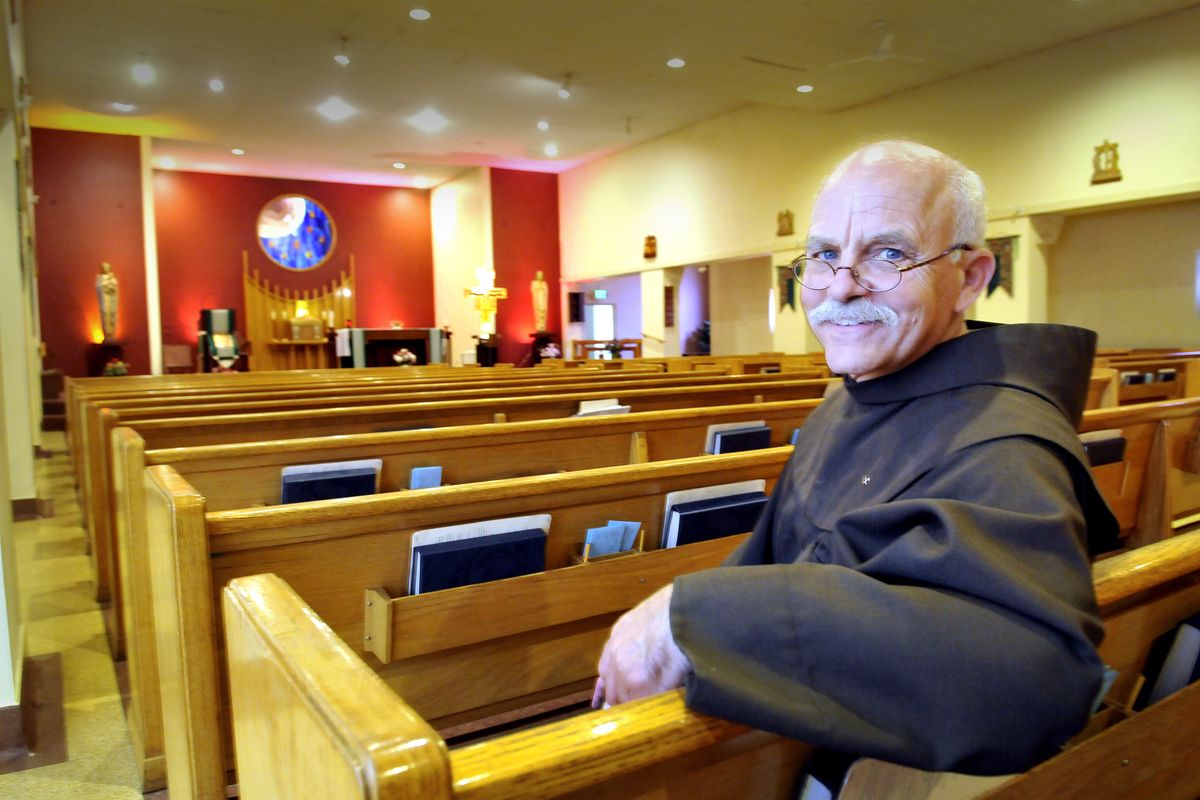The Rev. Michael Blackburn, pastor of St. Francis of Assisi Parish, in his Spokane church Friday. Recently, Blackburn donated a kidney. (Jesse Tinsley)