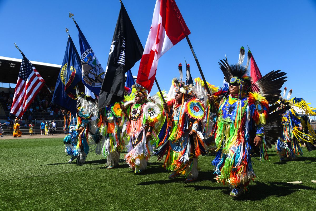 Fancy Dancers carry the flags for the Julyamsh Powwow Grand Entry, Sunday, July 22, 2018, at the Kootenai County Fairgrounds. The annual event is set to return this weekend. (Dan Pelle / The Spokesman-Review)