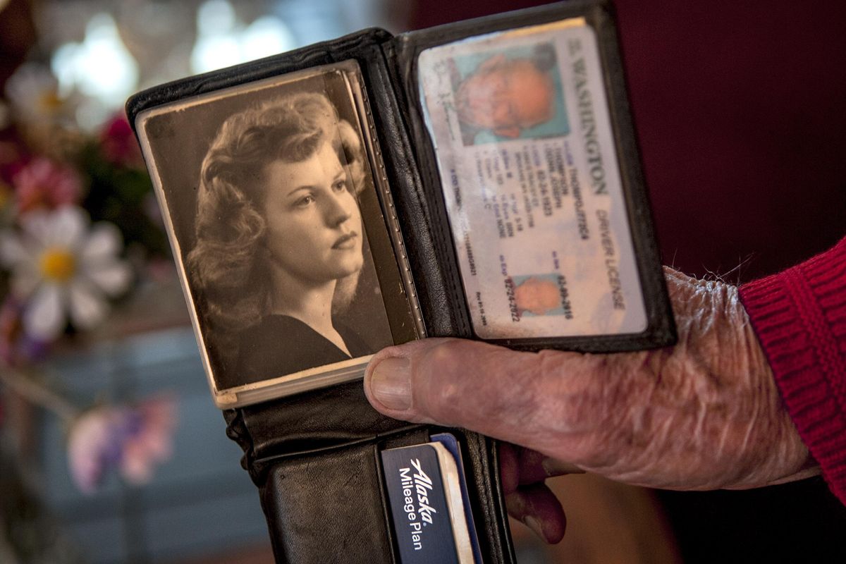 Donn Thompson has kept this picture of his wife Dude (Dew-dee) Thompson in his wallet since 1943 before they were married. Donn and Dude Thompson will celebrate their 70th wedding anniversary on Thursday, April 6, 2017. They talked about the picture at their home in Spokane on Wednesday, March 29, 2017. (Kathy Plonka / The Spokesman-Review)