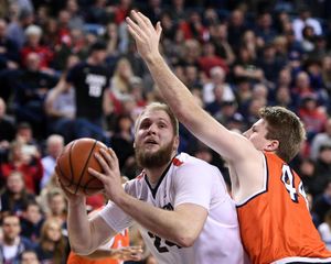 Gonzaga center Przemek Karnowski (24) looks to the basket as Pepperdine center Ryan Keenan (44) defends during the first half of a NCAA college basketball game, Thurs., Dec. 29, 2016, in the McCarthey Athletic Center. (Colin Mulvany / The Spokesman-Review)