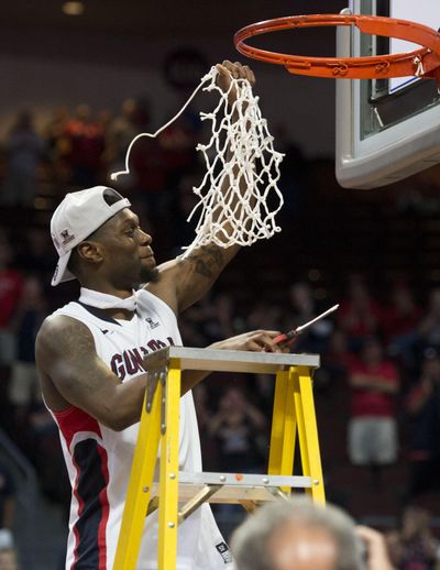 Gonzaga guard Gary Bell Jr. cuts down the net after the Bulldogs beat BYU to take the 2015 WCC Championship title, Tuesday, March 10, 2015, at the Orleans Arena in Las Vegas, Nevada. (File The Spokesman-Review)