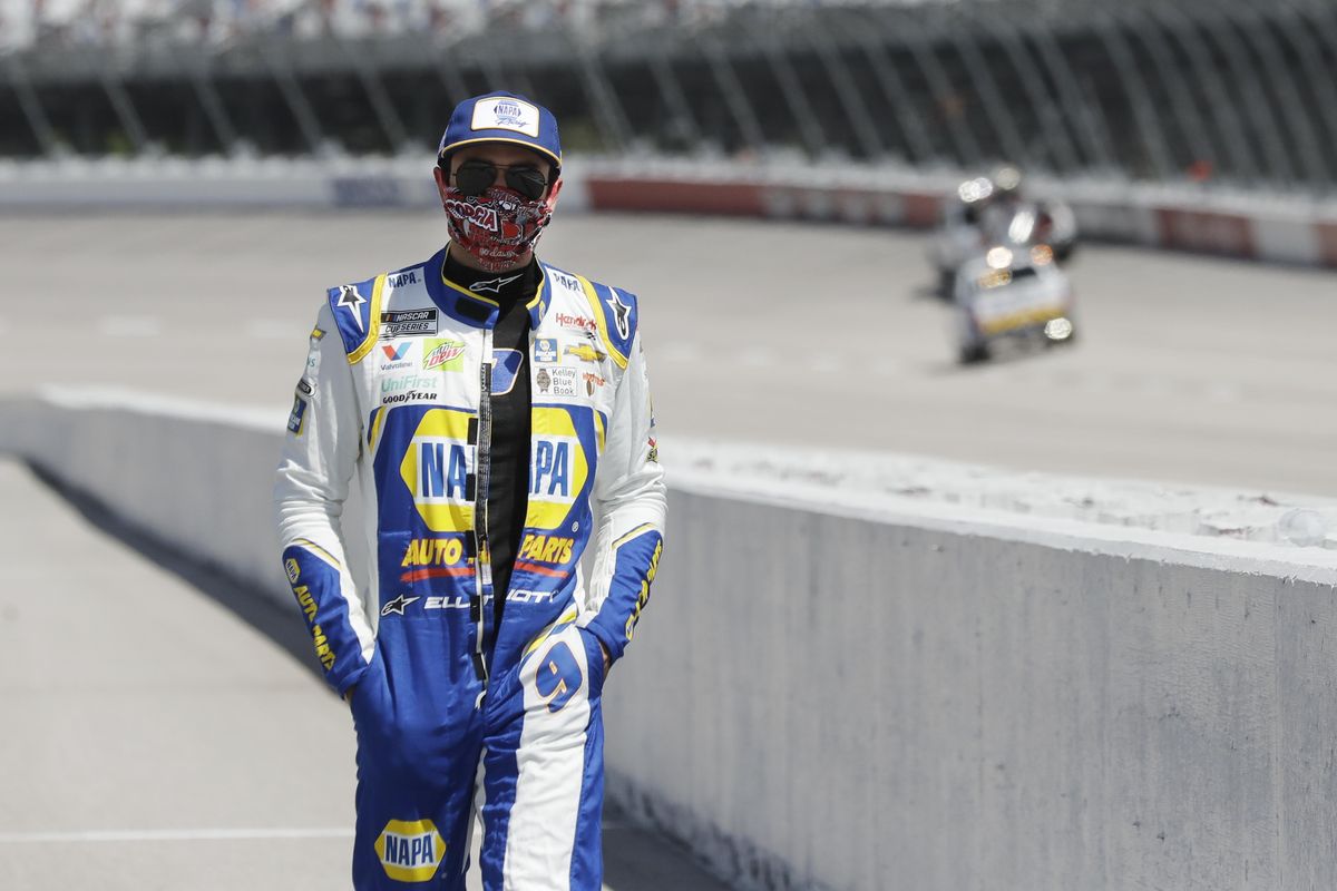 Driver Chase Elliott walks to his car for the start of the NASCAR Cup Series auto race Sunday, May 17, 2020, in Darlington, S.C. (Brynn Anderson / Associated Press)