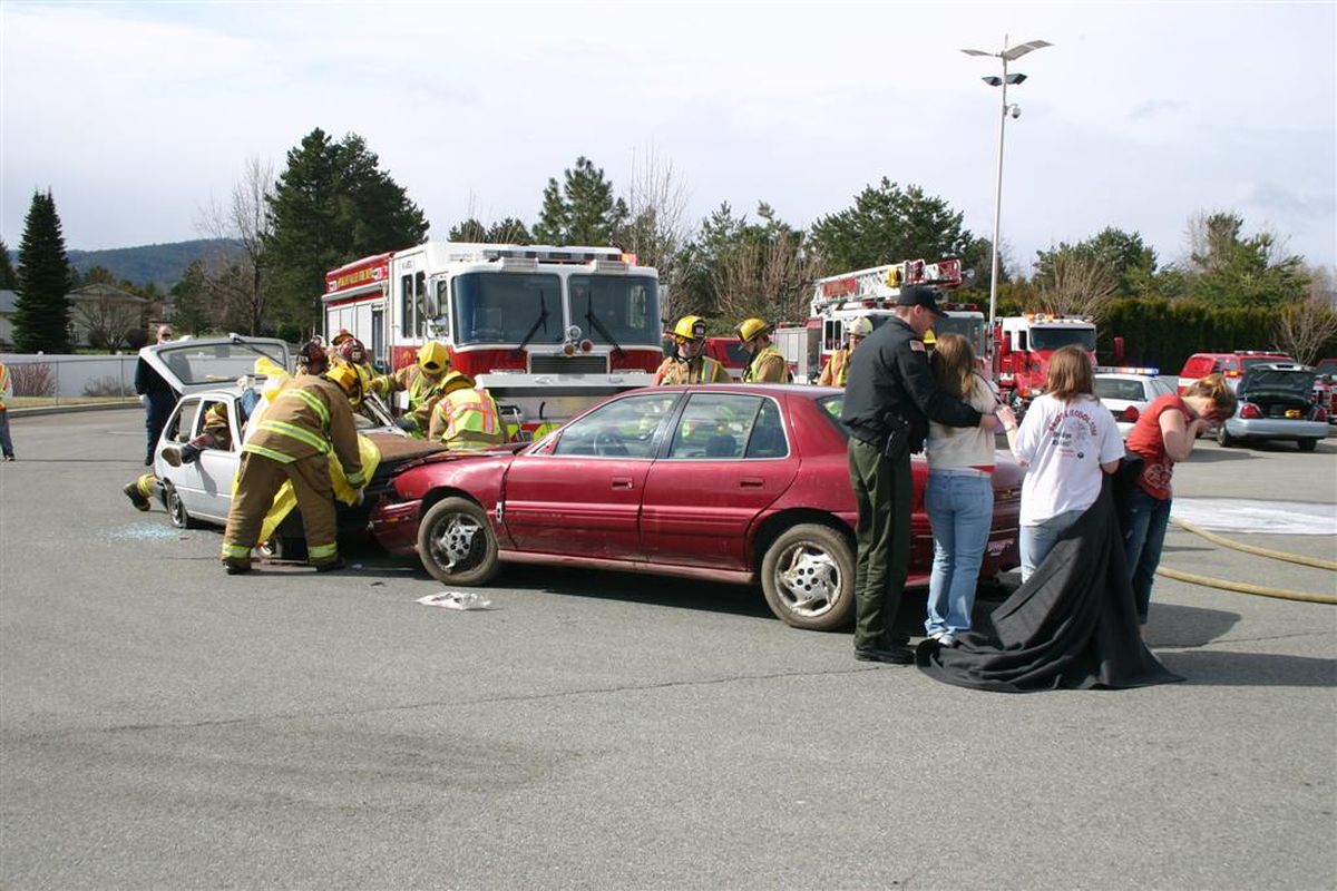 Central Valley High School students and emergency responders participate in a mock crash staged April 14, 2011 to warn students of the dangers of drinking and driving. (Photo courtesy Spokane Valley Fire Department)