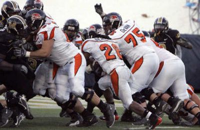 
Yvenson Bernard (26) plows past teammates for the two-point conversion that earned Oregon State a 39-38 Sun Bowl win … 
 (Associated Press / The Spokesman-Review)