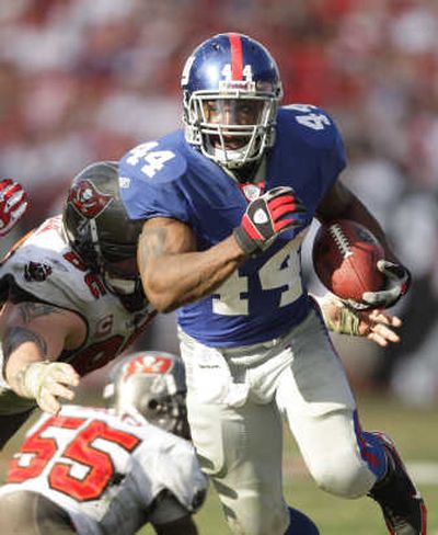 
Ahmad Bradshaw gives the Giants a speedy back in the second half after defenses are exhausted. Associated Press
 (Associated Press / The Spokesman-Review)