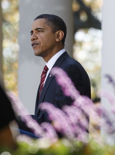 President Barack Obama speaks in the Rose Garden of the White House about health care reform  Sunday.  (Associated Press / The Spokesman-Review)