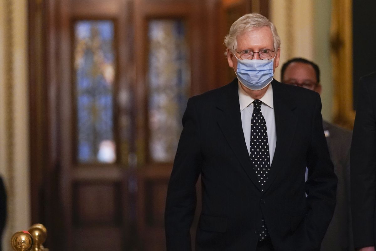 Senate Majority Leader Mitch McConnell of Kentucky walks from the Senate floor to his office on Capitol Hill on Jan. 6 in Washington.  (Manuel Balce Ceneta)