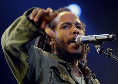 Jamaican singer Ziggy Marley, son of Bob Marley, performs on the chapiteau stage during the Paleo Festival, in Nyon, Switzerland, Wendnesday, July 19, 2006. (AP Photo/Keystone, Salvatore Di Nolfi) ORG XMIT: NY212 (Salvatore Nolfi / The Spokesman-Review)