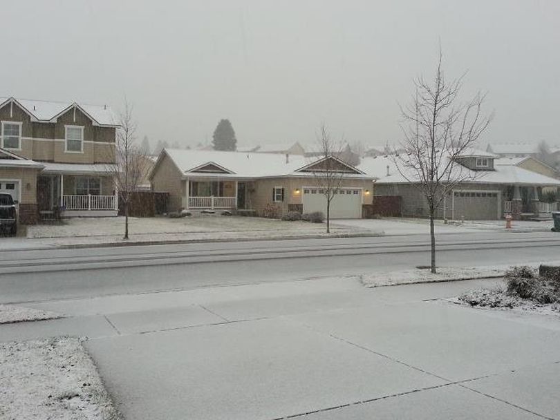 Snow was falling in one Post Falls neighborhood this morning. (Jesse Tinsley)