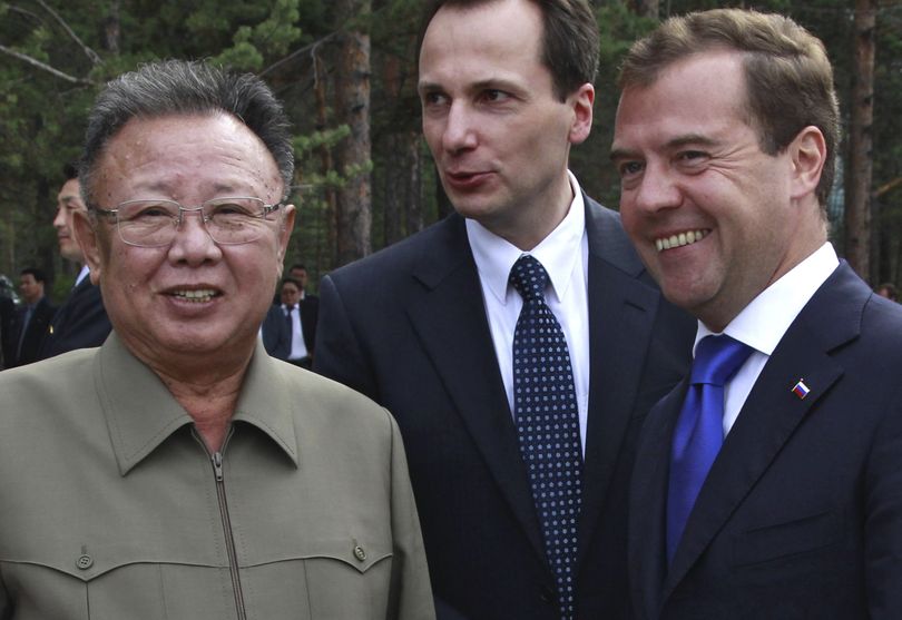 Aug. 24, 2011: Kim listens to Russian President Dmitry Medvedev, right, during a summit meeting at a military garrison in eastern Siberia. (Associated Press)