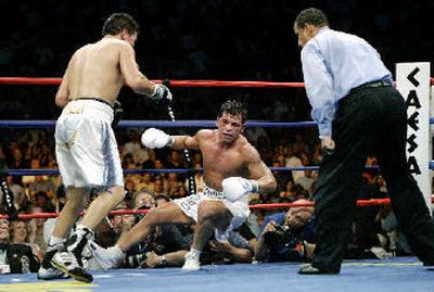 
Carlos Baldomir knocks out Arturo Gatti in the ninth round. 
 (Associated Press / The Spokesman-Review)