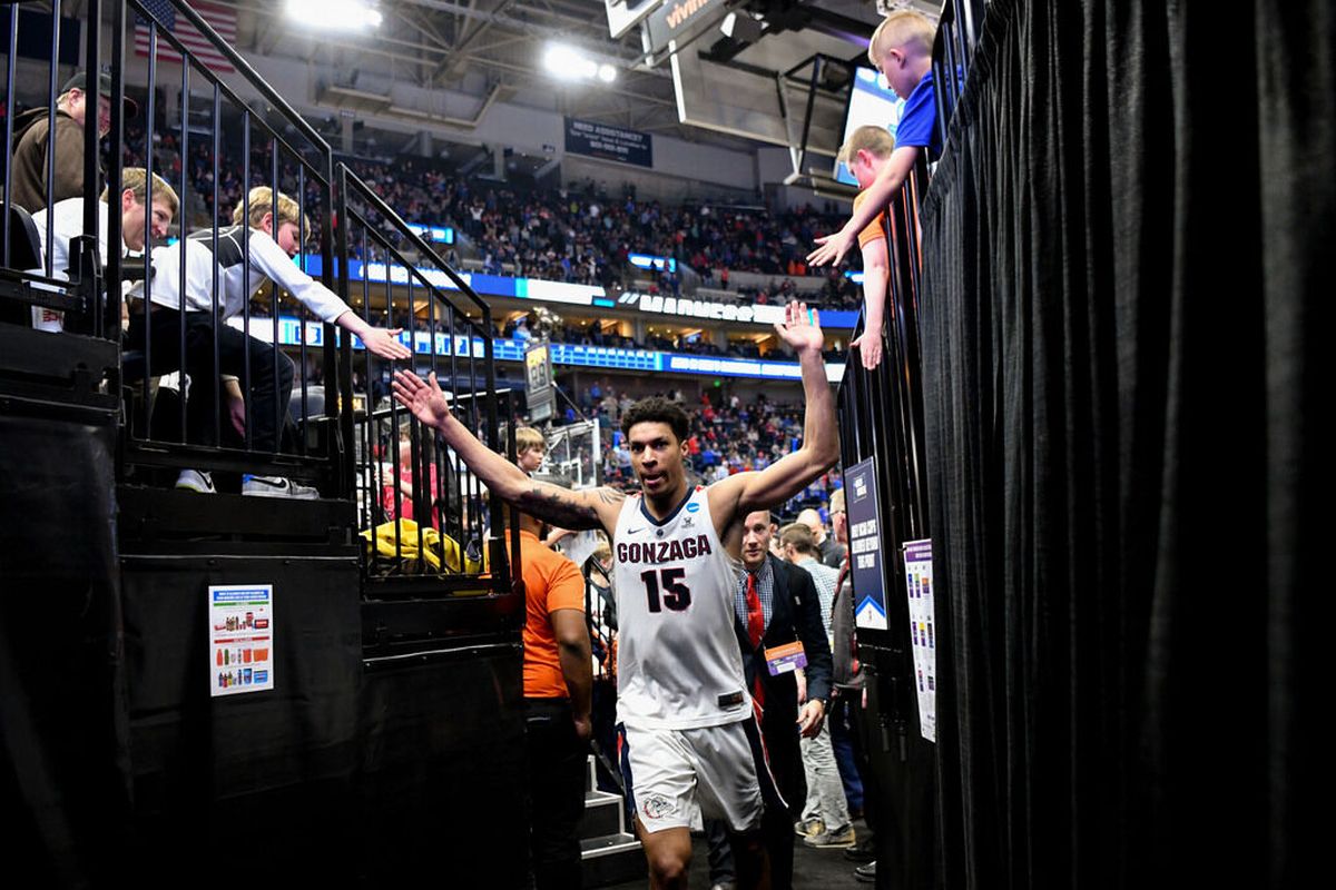 Gonzaga forward Brandon Clarke high-fives fans as he heads to the locker room after the Bulldogs defeated Baylor 83-71 in the second round of the NCAA Tournament on March 23, 2019, in Salt Lake City.  (Tyler Tjomsland / The Spokesman-Review)
