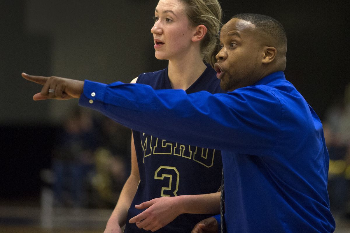Mead coach Quantae Anderson, offering advice to sophomore Sue Winger, believes in giving his players offensive freedom. (Colin Mulvany)