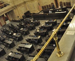 OLYMPIA -- The House convenes for a "pro forma" session on Monday, July 6, with Rep. Timm Ormsby, D-Spokane, wielding the gavel for an empty chamber. (Jim Camden/Spokesman-Review)