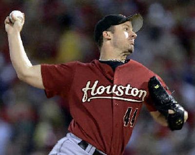 
Houston starter Roy Oswalt delivers a first-inning pitch to St. Louis on Thursday. 
 (Associated Press / The Spokesman-Review)