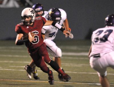 North Central quarterback Quinn Zerba scrambles for a second-half touchdown Friday night. (Jesse Tinsley)