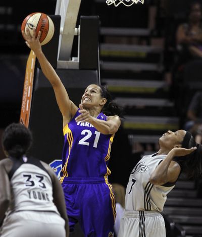 Sparks’ Ticha Penicheiro scored 18 in WNBA victory. (Associated Press)