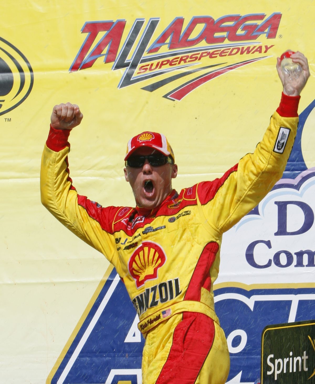 Kevin Harvick celebrates winning at Talladega on Sunday, his first victory in 115 races. (Associated Press)