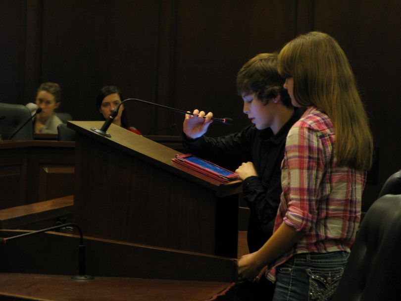 Middle school students Shandy Gillman and Derik Johnson testify in favor of increasing school funding in Idaho (Betsy Russell)