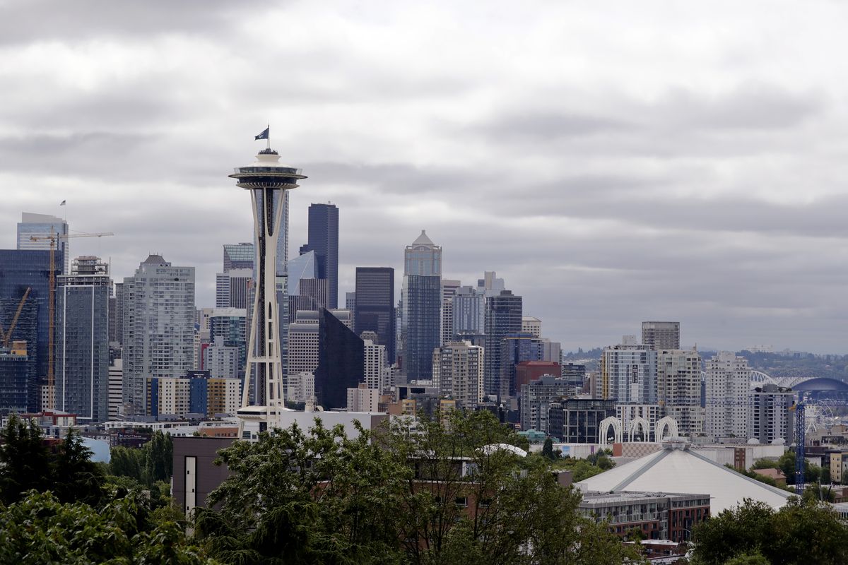This July 23, 2020 photo shows the view of the Space Needle, in Seattle. Record-high heat is forecast in the Pacific Northwest this weekend, raising concerns about wildfires and the health of people in a region where many don