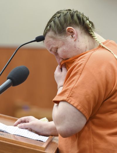 FILE - in this July 16, 2020 file photo, JoAnn Cunningham, cries and wipes her nose during her sentencing hearing in Woodstock, Ill. On Friday, June 17, 2020 Cunningham was sentenced to 35 years in prison for beating her five-year-old son to death in April of 2019.  (John Starks)