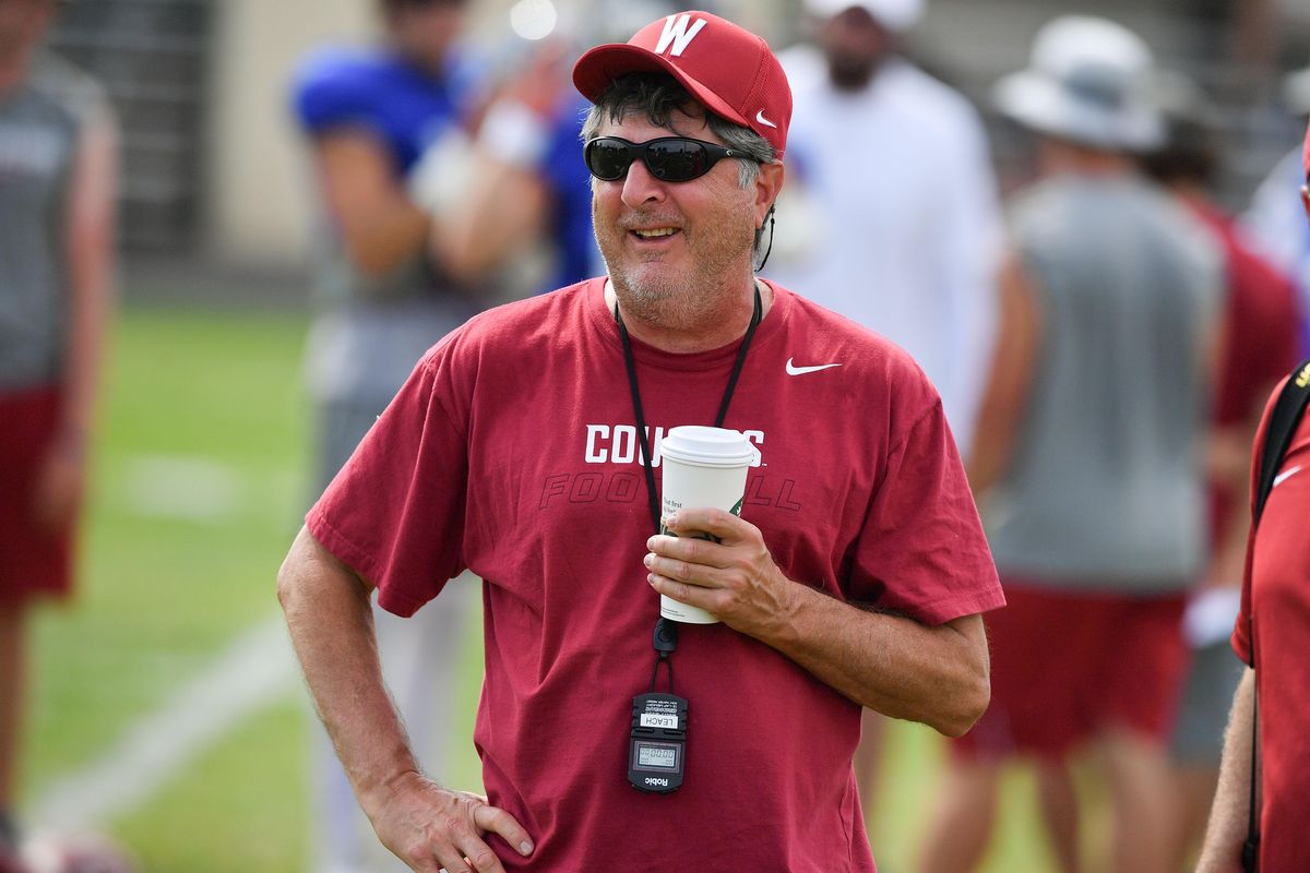 Washington State Cougars head coach Mike Leach smiles during a practice on Wednesday, August 7, 2019, at Sacajawea Jr. High School in Lewiston, ID. (Tyler Tjomsland / The Spokesman-Review)