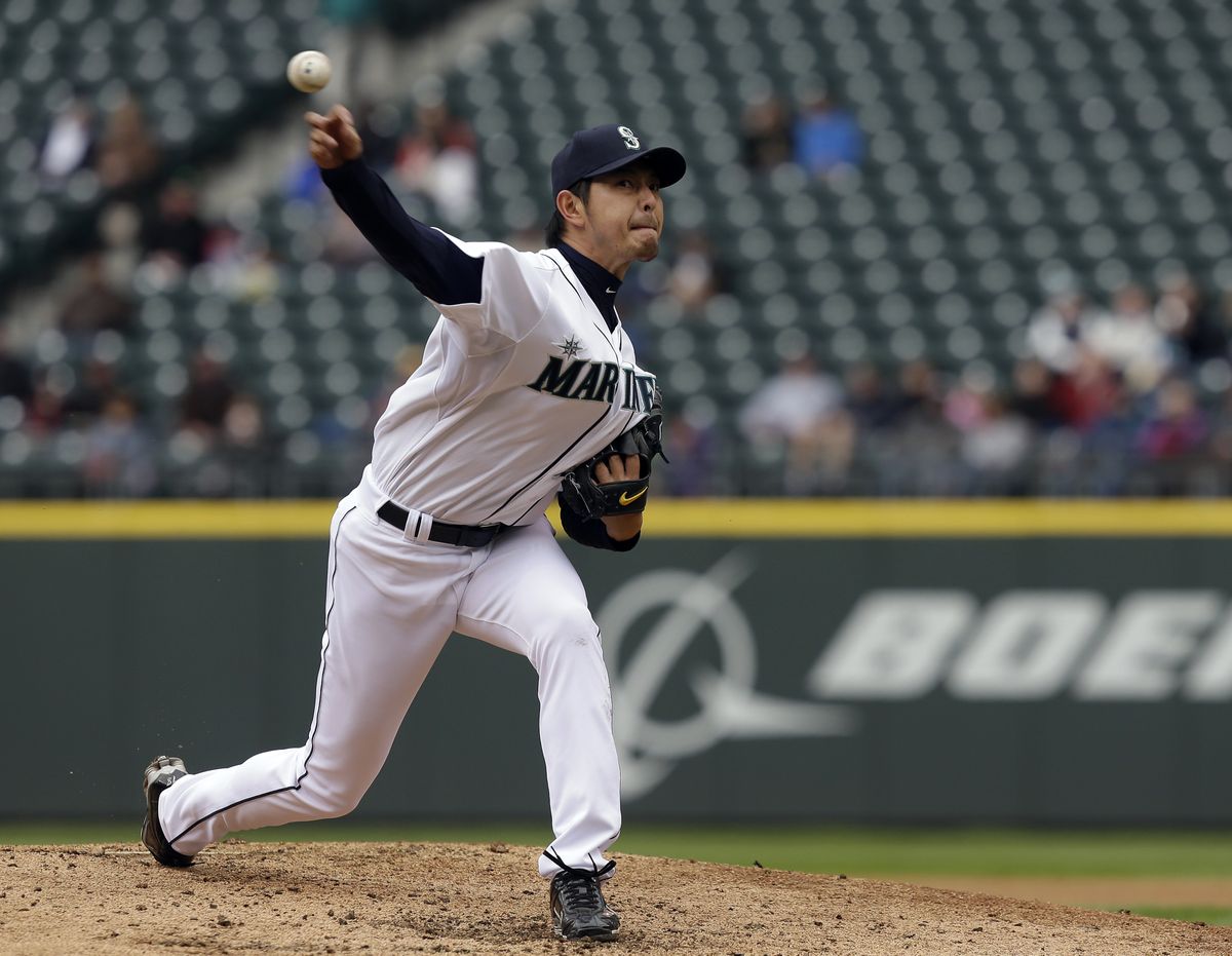 Seattle Mariners starting pitcher Hisashi Iwakuma threw 70 pitches over six innings, striking out two Tigers, before exiting the game because of a blister on the middle finger of his right hand. (Associated Press)