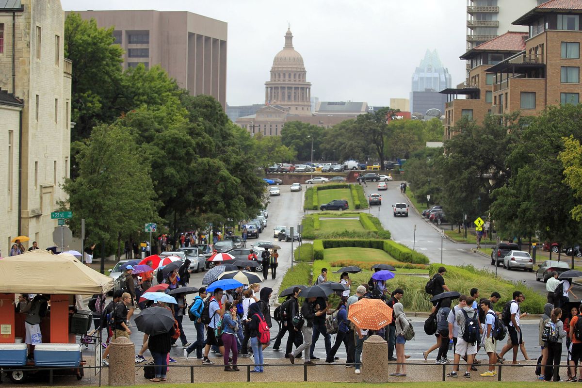 University of Texas students evacuate campus after the university received a bomb threat Friday morning, Sept. 14, 2012 in Austin, Texas. The university received a call about 8:35 a.m. local time from a man claiming to be with al-Qaida who said he had placed bombs all over the 50,000-student Austin campus, according to University of Texas spokeswoman Rhonda Weldon. (Ricardo B.brazziell / Statesman.com)