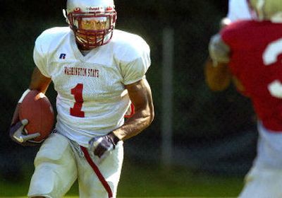 Derrell Hutsona may end up being the first Cougar to touch the football to open the 2006 season as a kick returner.
(Christopher Anderson / The Spokesman-Review)