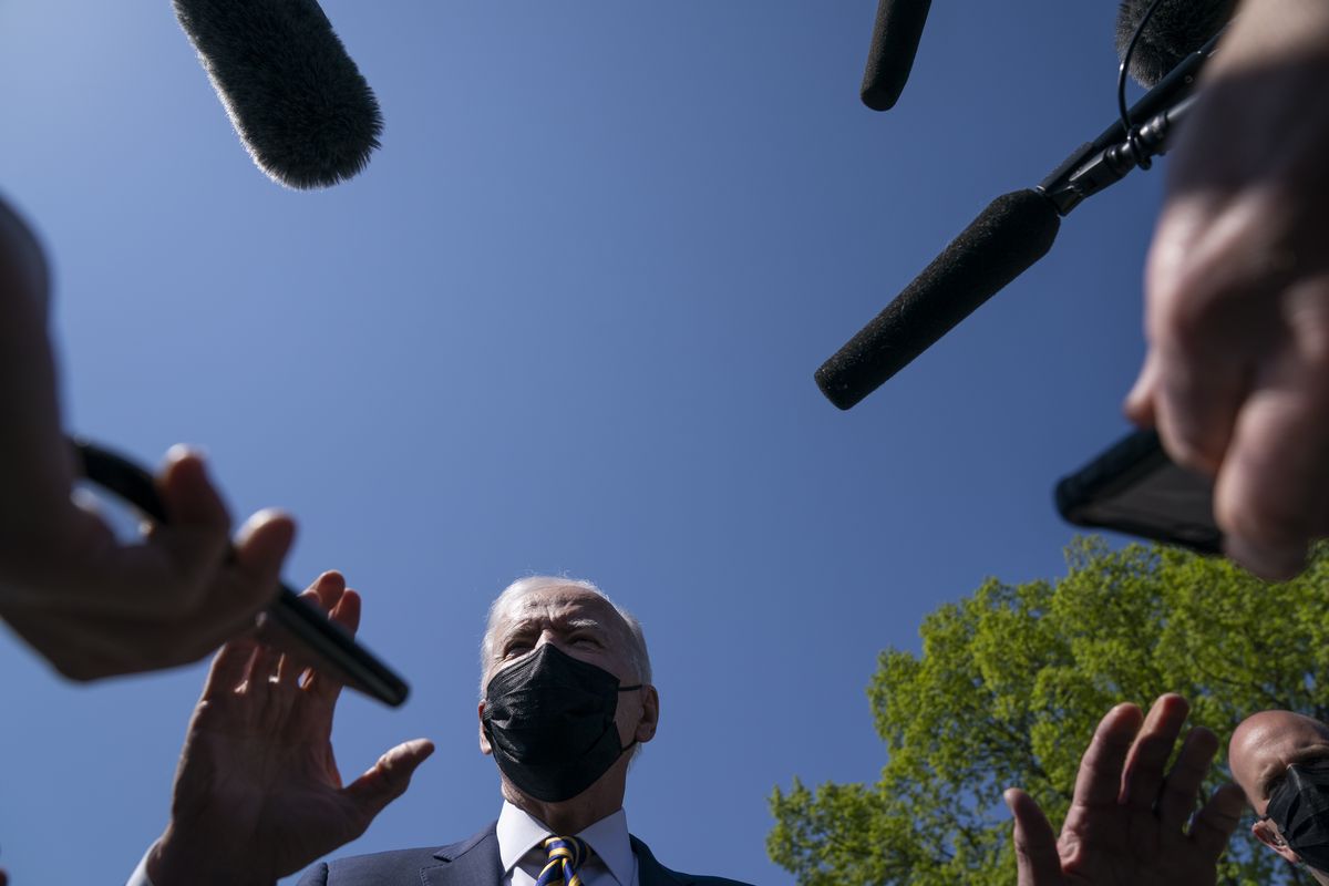 President Joe Biden talks with reporters on the Ellipse on the National Mall after spending the weekend at Camp David, Monday, April 5, 2021, in Washington.  (Evan Vucci)