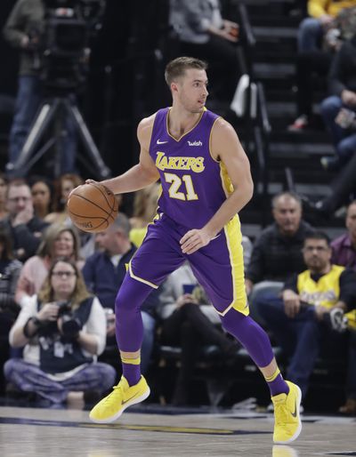 In this March 19, 2018 photo, Los Angeles Lakers’ Travis Wear plays during the first half of an NBA basketball game against the Indiana Pacers, in Indianapolis. Wear is one of the G League players who helped USA Basketball qualify for the World Cup, and now he and a few others are being brought back to the team for the final week of training camp against NBA players who will actually play in the tournament in China later this month. (Darron Cummings / Associated Press)