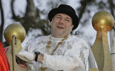 
James Gandolfini smiles as he rolls in the Krewe of Bacchus parade during the Mardis Gras celebration in New Orleans on Sunday. 
 (Associated Press / The Spokesman-Review)