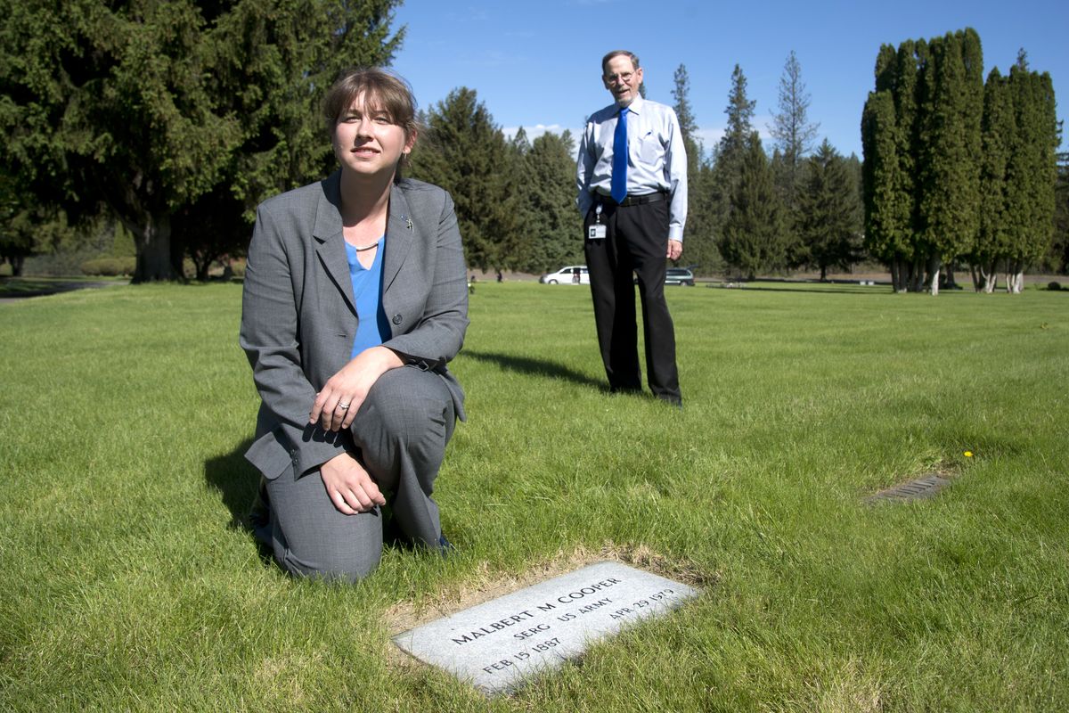 Veterans Services Officer Nadel Barrett, left, and Veterans Services Director Chuck Elmore helped secure the headstone for Malbert Cooper’s grave at Spokane-Cheney Memorial Gardens. The pre-World War I veteran died in 1979 and was buried without honors in an unmarked grave. Barrett’s research prompted the Department of Veterans Affairs to pay for a headstone. (Jesse Tinsley)