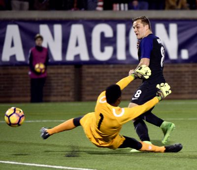 United States' Jordan Morris (8) is defended by Jamaica's Andre Blake (1) during first half of a friendly soccer match Friday, Feb. 3, 2017, in Chattanooga, Tenn. (AP Photo/Billy Weeks) ORG XMIT: TNBW108 (Billy Weeks / AP)