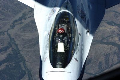  Maj. Nicole Malachowski takes on fuel supplied by a Fairchild Air Force Base KC-135 tanker  last month. 
 (Dan Pelle / The Spokesman-Review)