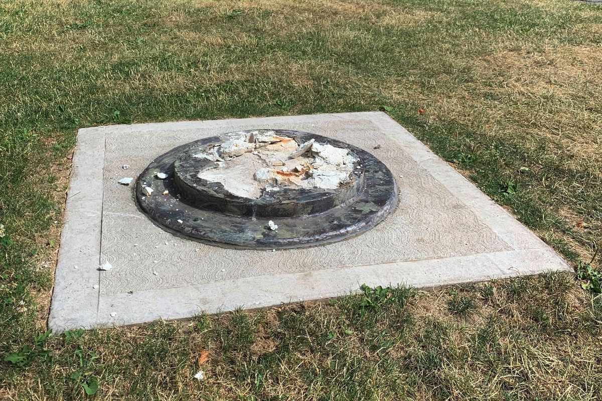 This photo provided by WROC-TV shows the remnants of a Frederick Douglass statue ripped from its base at a park in Rochester, N.Y., Sunday, July 5, 2020. The statue of abolitionist Douglass was ripped on the anniversary of one of his most famous speeches, delivered in that city in 1852.  (Ben Densieski)
