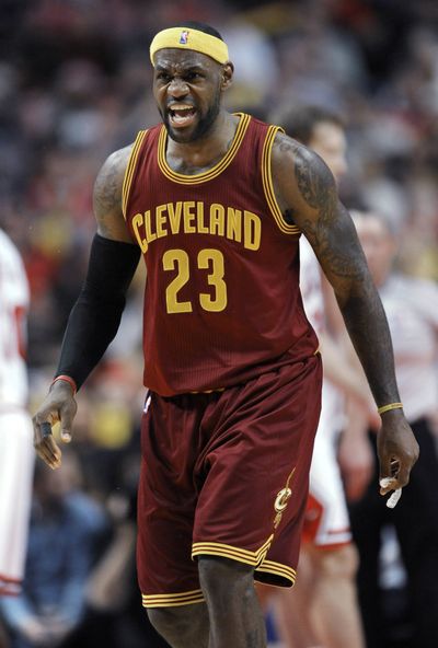 LeBron James lifted Cavs with 8 of his 36 points in overtime. (Associated Press)