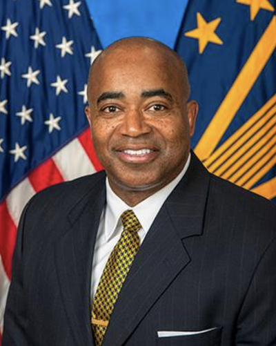 John Windom, a former Department of Veterans Affairs official who oversaw the acquisition and deployment of a faulty computer system that contributed to patient harm after it was launched in Spokane in 2020, appears in his official government photo.  (Courtesy of Federal Electronic Health Record Modernization Office)