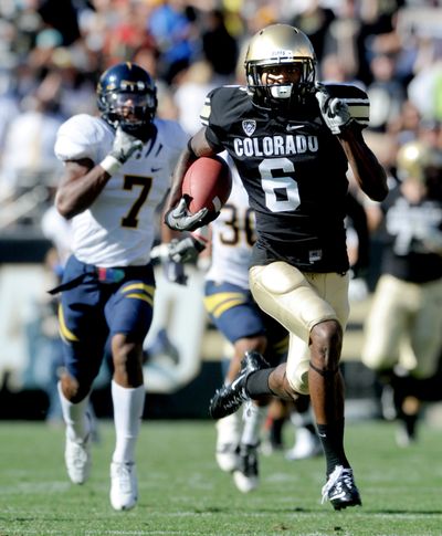 Colorado's Paul Richardson (6) takes off with his second long touchdown catch past California's D.J. Campbell during an NCAA college football game in Boulder, Colo., Saturday, Sept. 10, 2011. (Cliff Grassmick / The Daily Camera)
