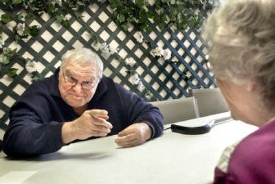 
Bob Guild, 72, and Phyllis Burwell, 82, reminisce about the 1960s during a conversation at Maplewood Gardens Retirement Center. 
 (Joe Barrentine / The Spokesman-Review)