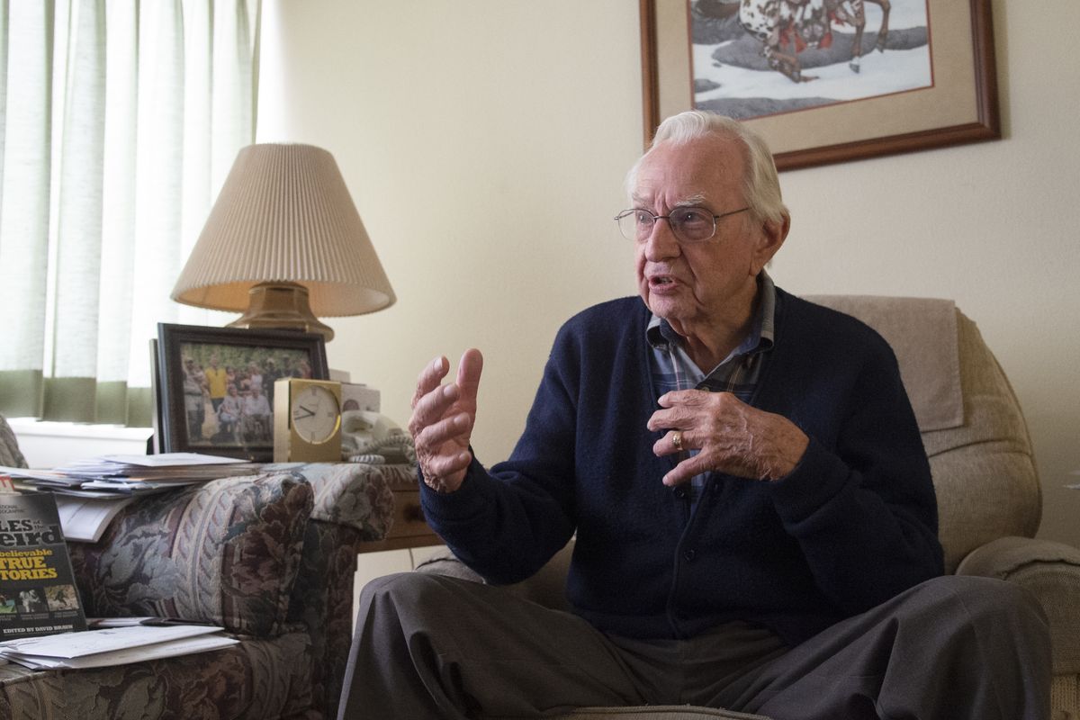 Stan Bennett, who turned 100 recently, was a corporate lawyer for most of his career, which followed his service in the Army Air Corps in Europe during World War II. He is photographed Sept. 14, at his apartment at Rockwood Retirement Center in Spokane.  (Jesse Tinsley/The Spokesman-Review)