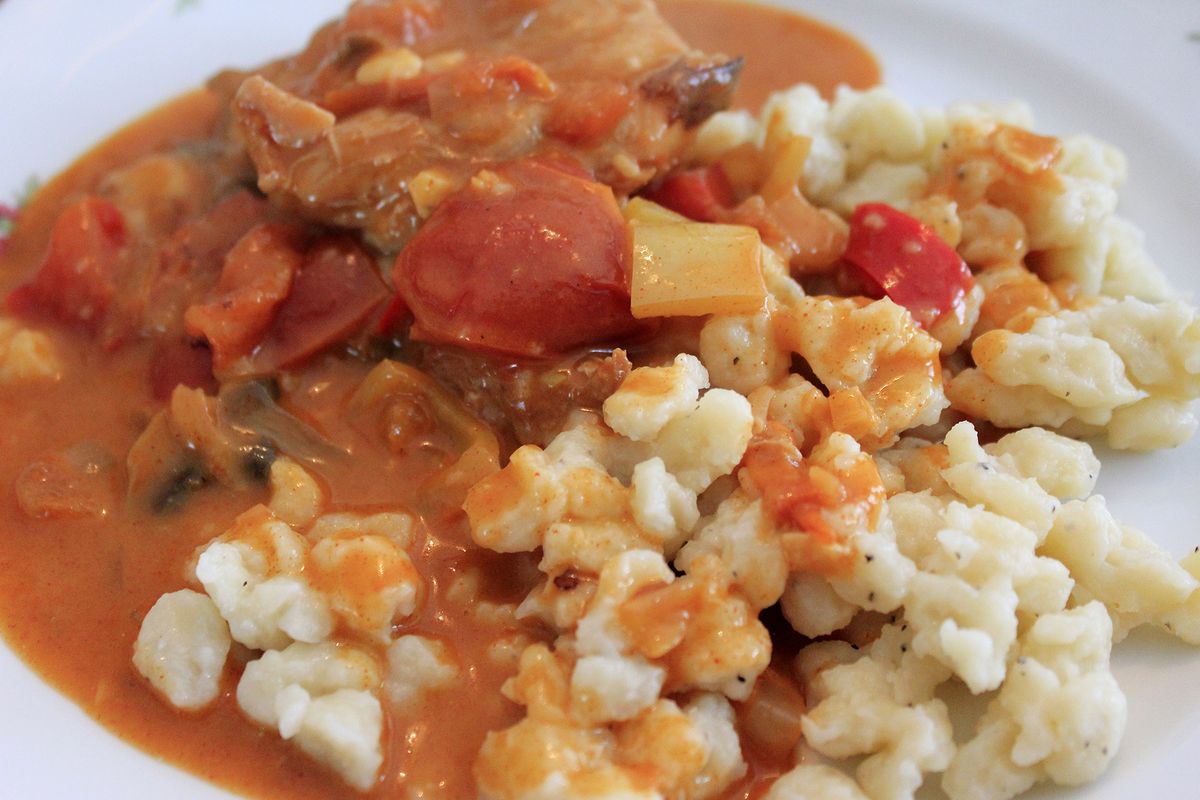 Chicken Paprikás is a vibrant, peppery stew, similar to goulash, and one of Hungary’s most famous traditional foods. (Adriana Janovich)